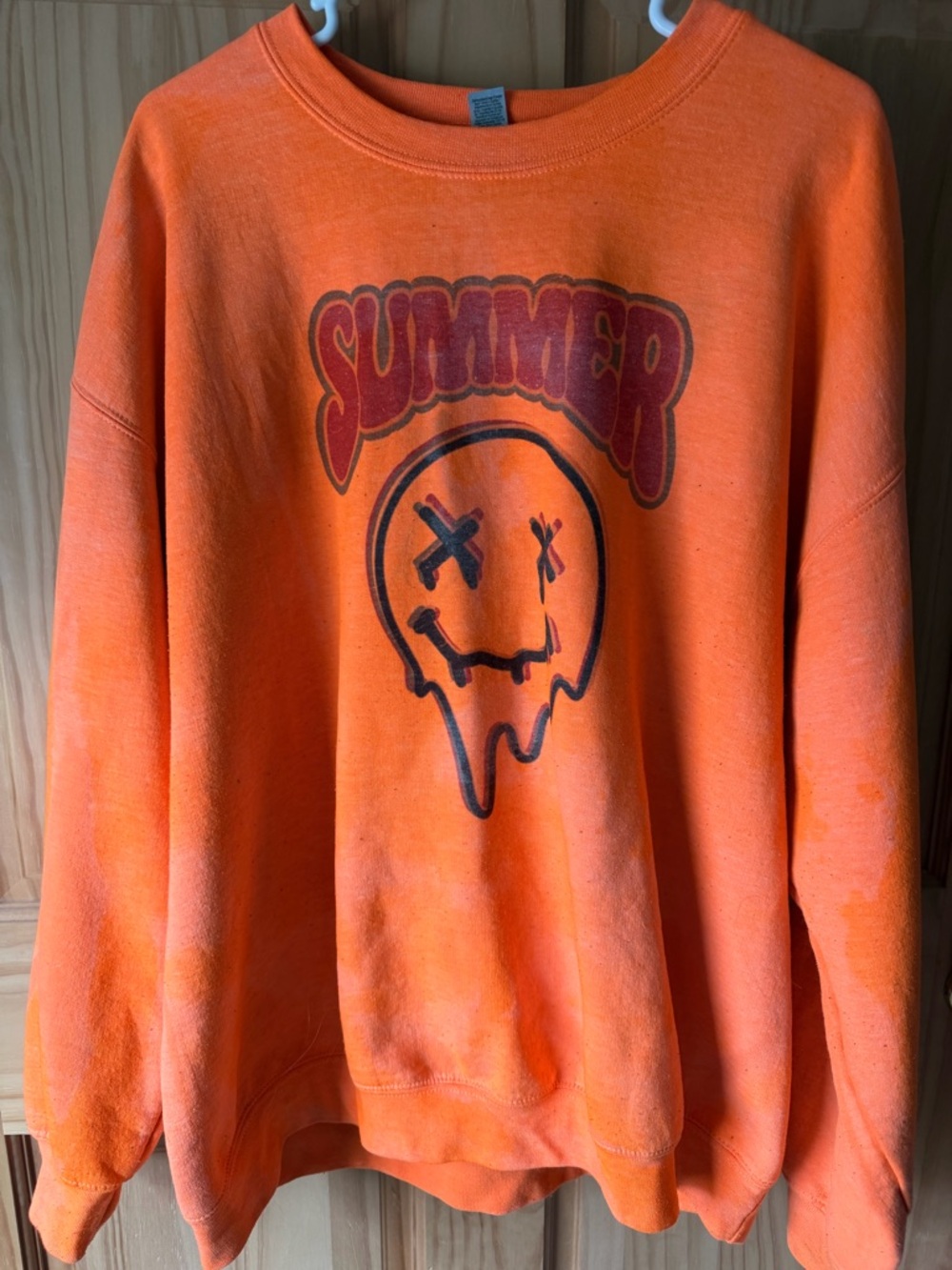 Gildan Orange Crewneck Sweatshirt with Melting Smiley Graphic
